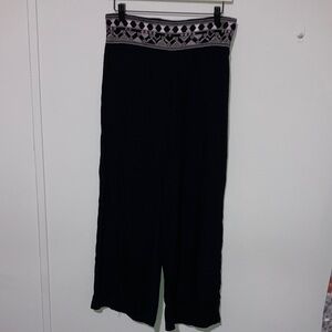 Elegant Black Wide-Leg Pants with Pink Detailing